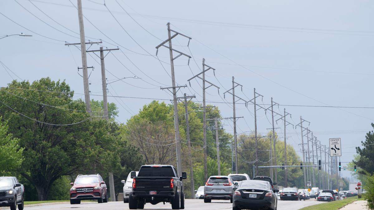 Power lines are seen along N. Rock Rd. near 13th St. in Wichita, KS.
