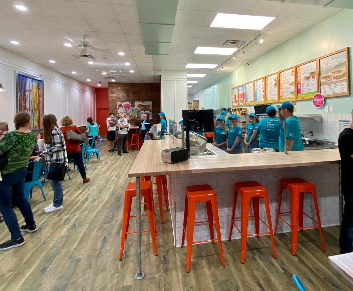 The first 50 people through the door of the new Tropical Smoothie Cafe on Saturday will get free smoothies for a year.