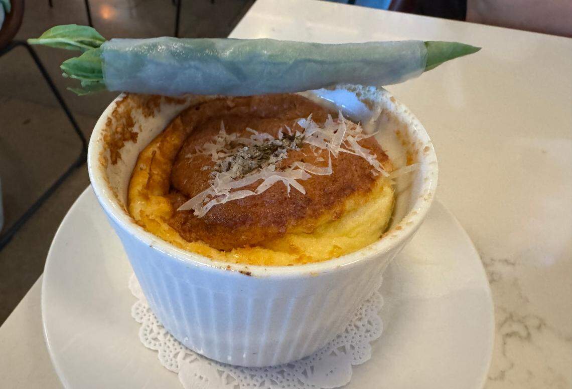 One of the dishes from last month’s Monthly Moods dinner at First Mile Kitchen: a cheese souffle garnished with a bundle of wild herbs, inspired by the cooking of Alice Waters and her famous Chez Panisse restaurant.