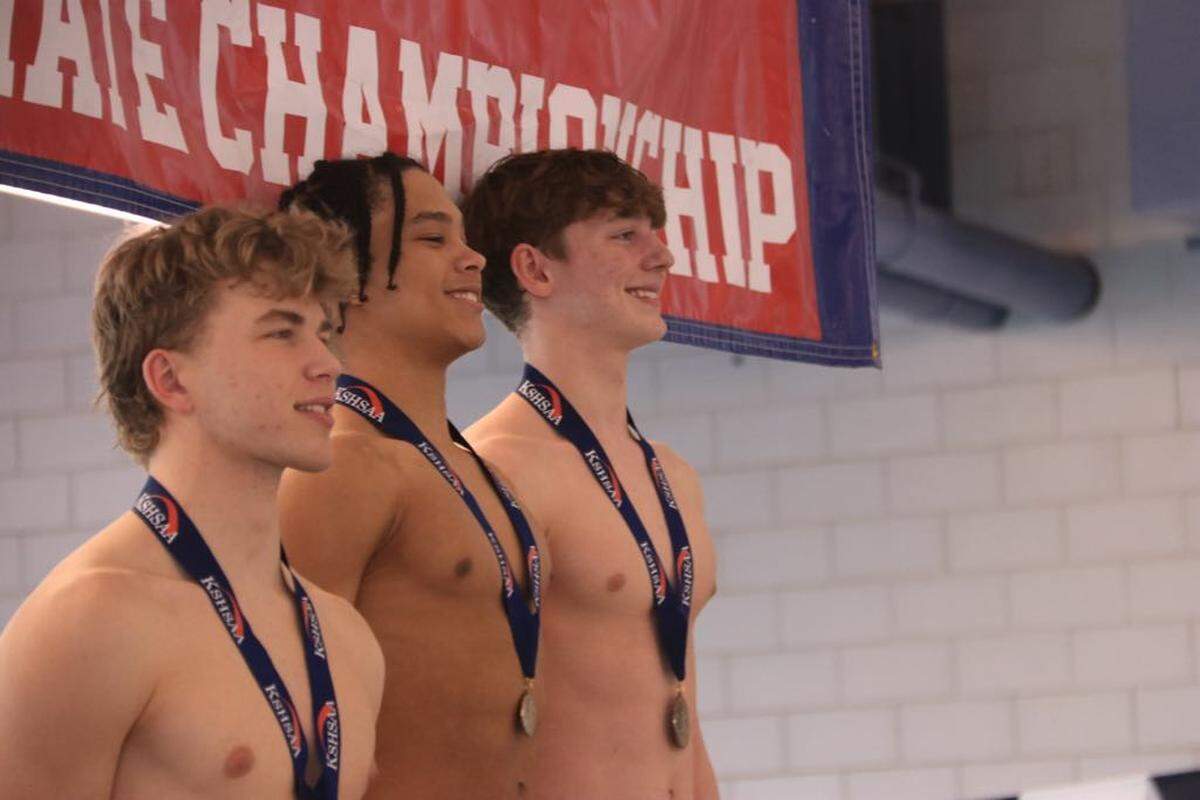 Winfield’s Corden Cuington (left) and Eisenhower’s Dylan Patterson (right) both stood on top of the podium after sharing the gold medal in the 50-yard freestyle.