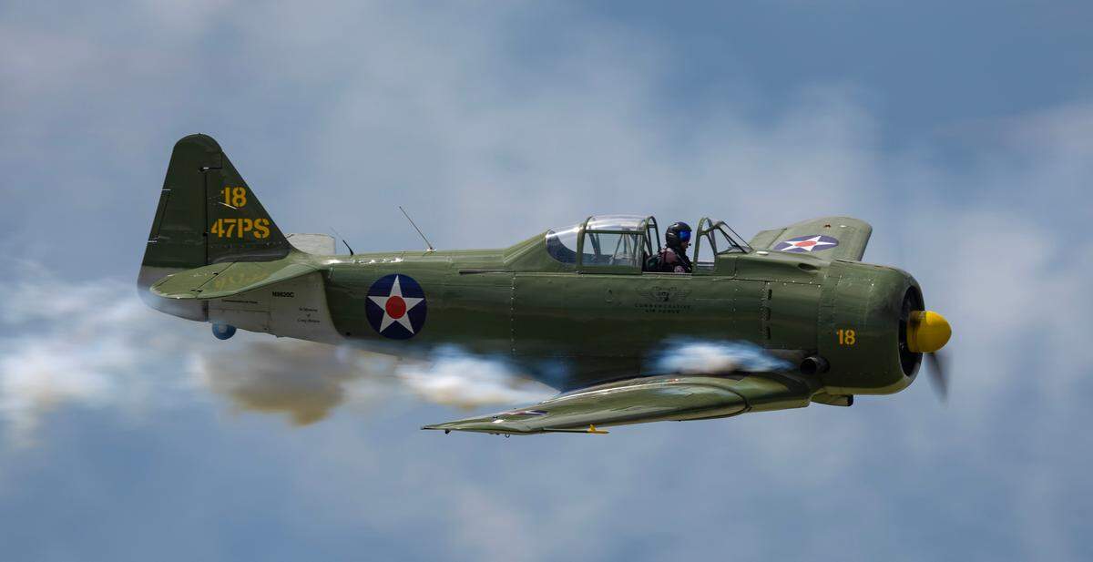 A member of the “Tora, Tora, Tora” show performs on Saturday during the Frontiers in Flight airshow at McConnell Air Force Base. .