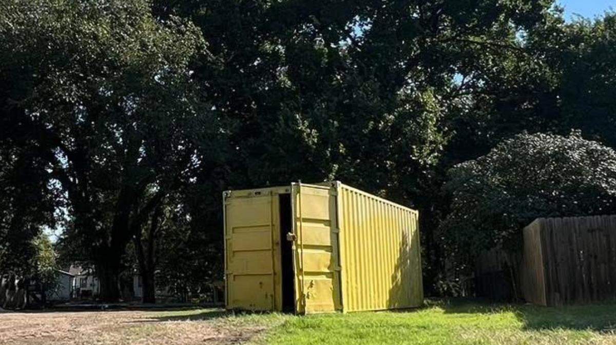 This photo of a yellow storage box at the former property of Dennis Rader, better known as the serial killer BTK, has some wondering what’s going on there.