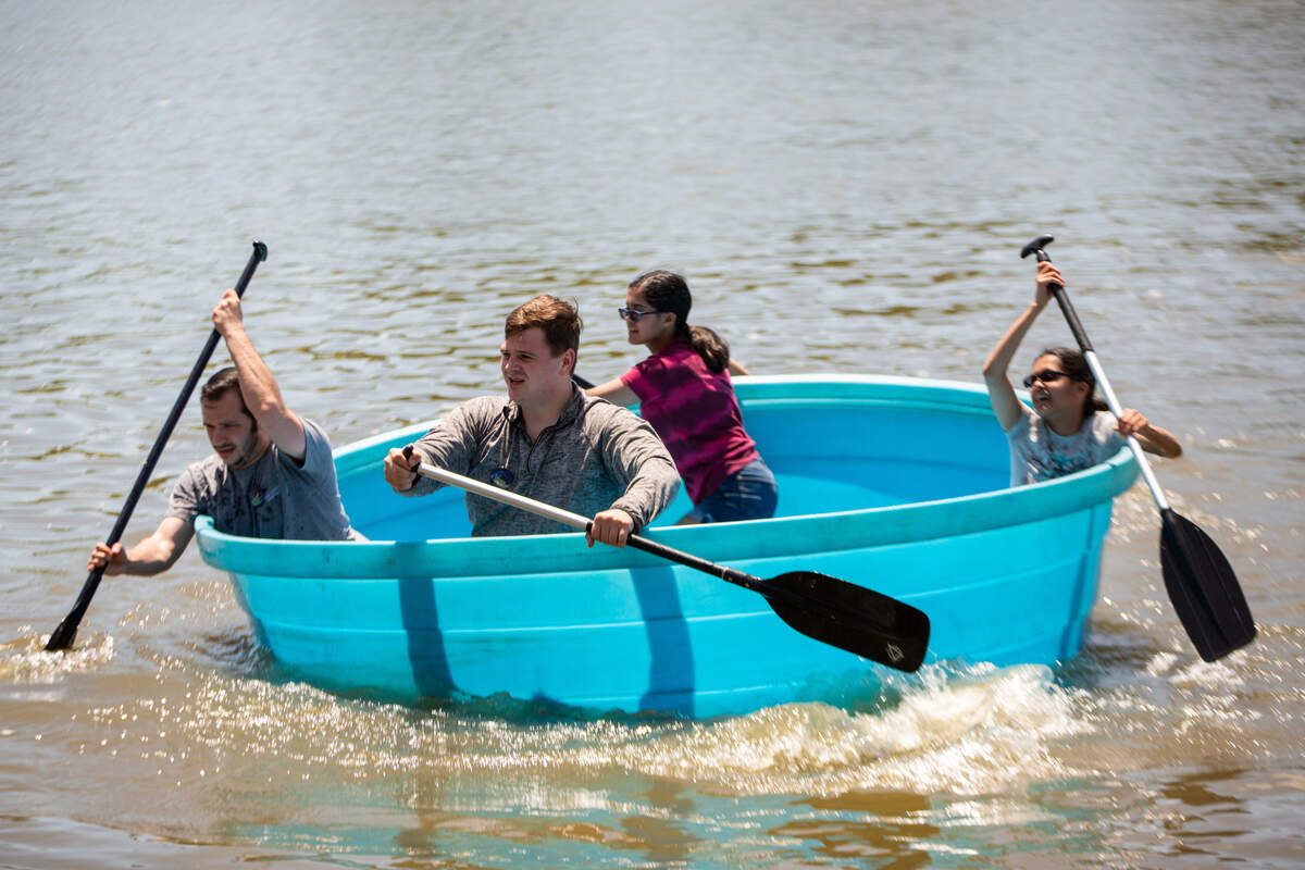 Participants in the cowboy bathtub races close the final gap in their race. The competition took place on the Arkansas River near Delano on Saturday.