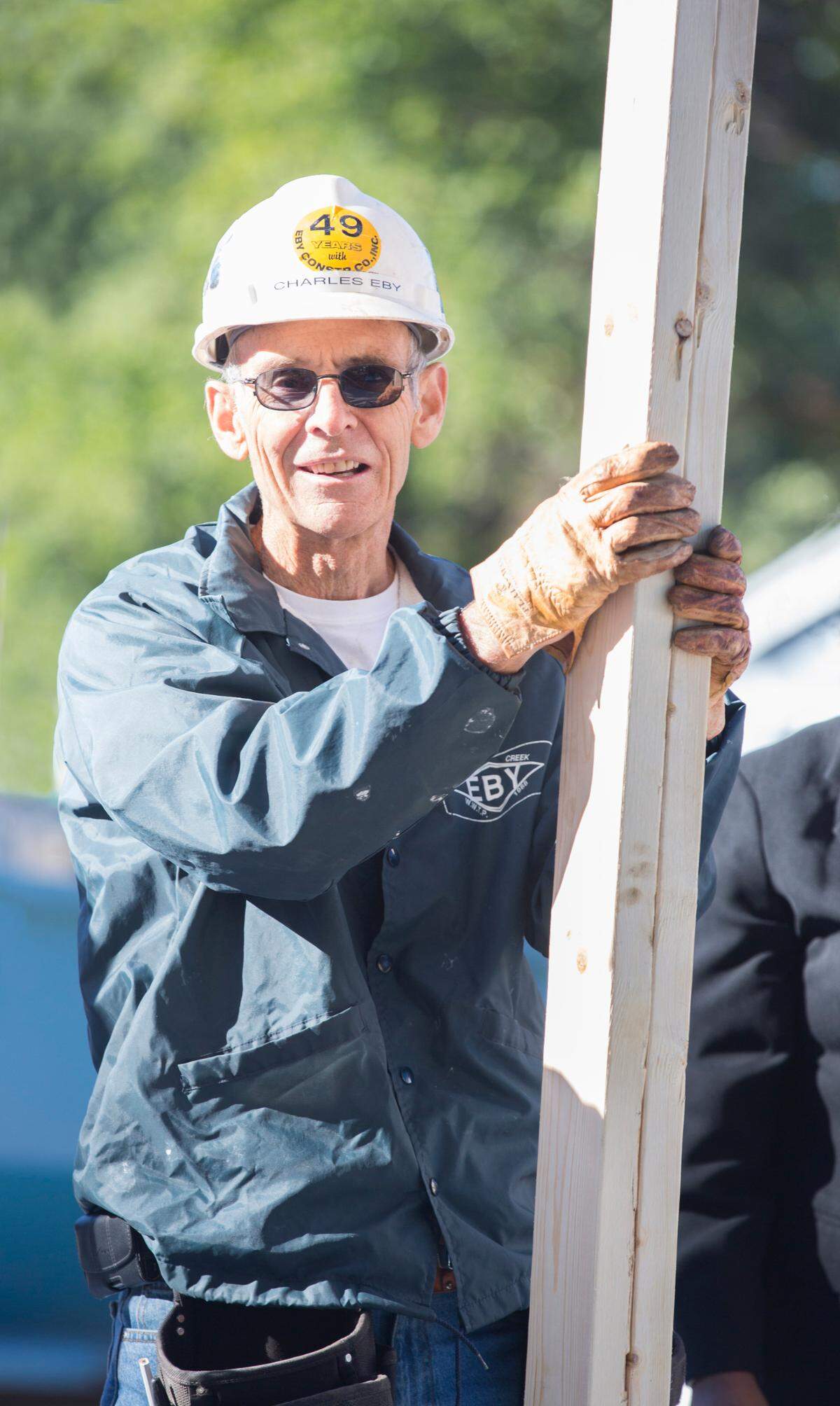 Charlie Eby working on a Habitat for Humanity build. Though he may not have been known for his job-site acumen, Eby was invaluable to the organization in myriad other ways.