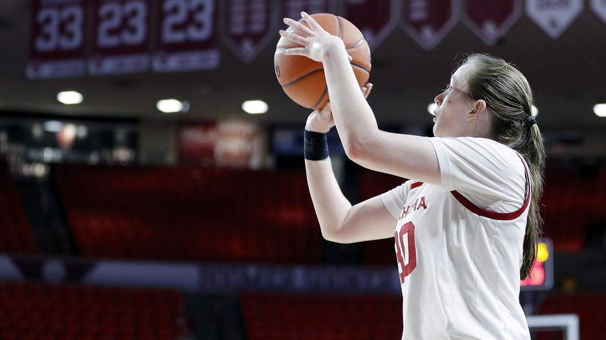 McPherson native Taylor Robertson became the all-time record holder in Big 12 history for three-pointers made in a career in Wednesday’s 83-77 win over Baylor.