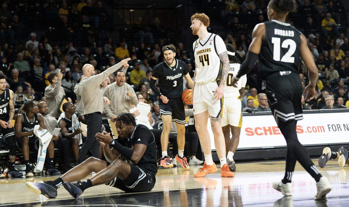 Milwaukee’s players and bench react to a call that goes their way in the first half against Wichita State.