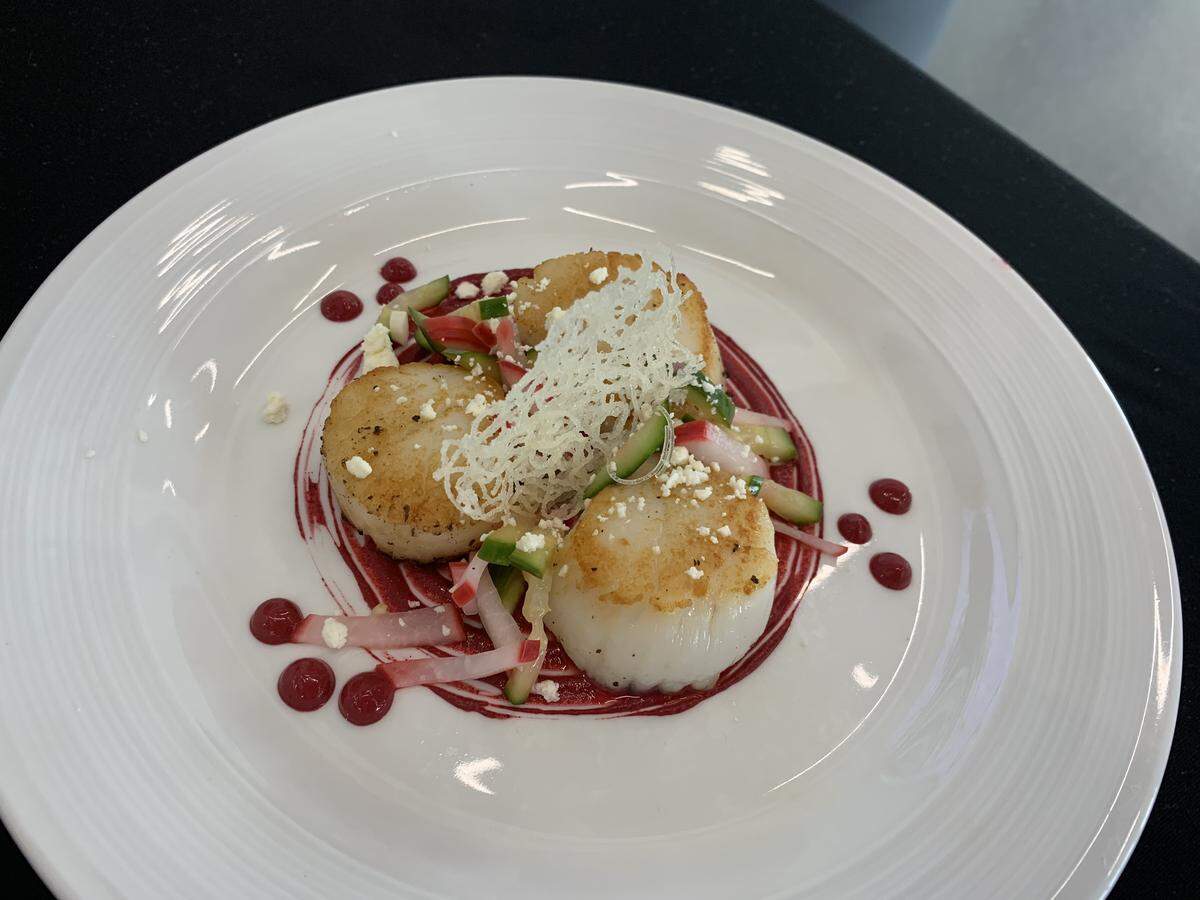 Seared scallops over a beet puree are one of the dishes the young Maize chefs will prepare in Washington, D.C.