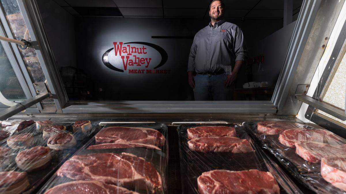 Matt Carselowey of the Walnut Valley Meat Market stands in his Augusta store. Carselowey operates retail markets in El Dorado, Winfield and Augusta.