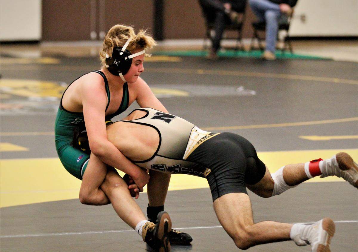 Newton’s Grant Treaster (right) is going for his third state championship this season.