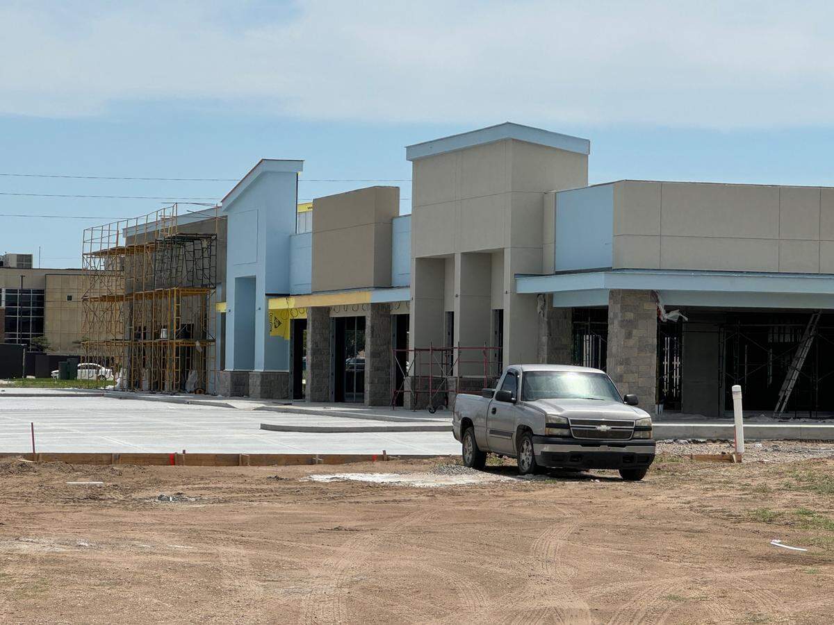 The under-construction Shops at Avante at 37th and Ridge will be home to the new Bricks & Minifigs Lego store, which should open in October.