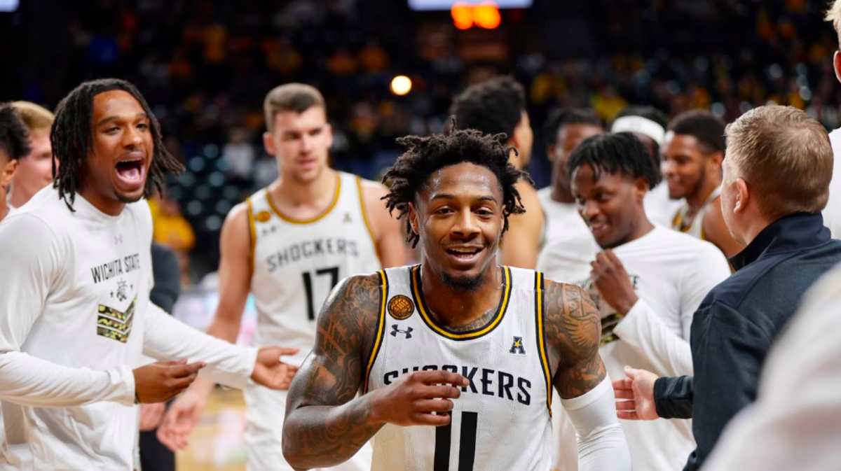 Wichita State senior point guard Justin Hill smiles after scoring a basket in the Shockers’ first home win against Montana State on Saturday.