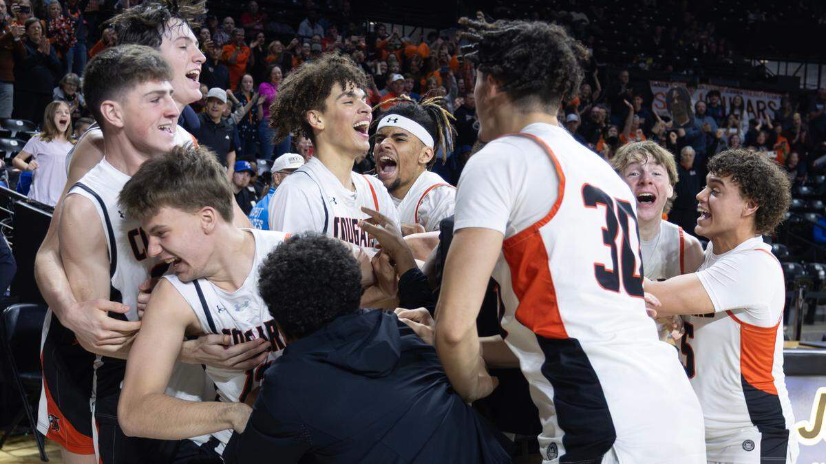 Shawnee Mission Northwest players celebrate the team’s win over Olathe North in the 6A Kansas state championship game on Saturday in Wichita.