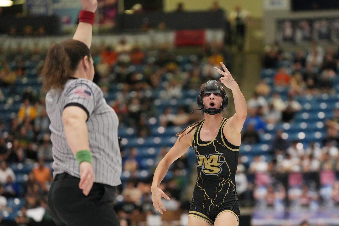 Maize South’s Krislynn Martinez reacts after winning the the 5A State Championship wrestling tournament. This is the second state title for Martinez.