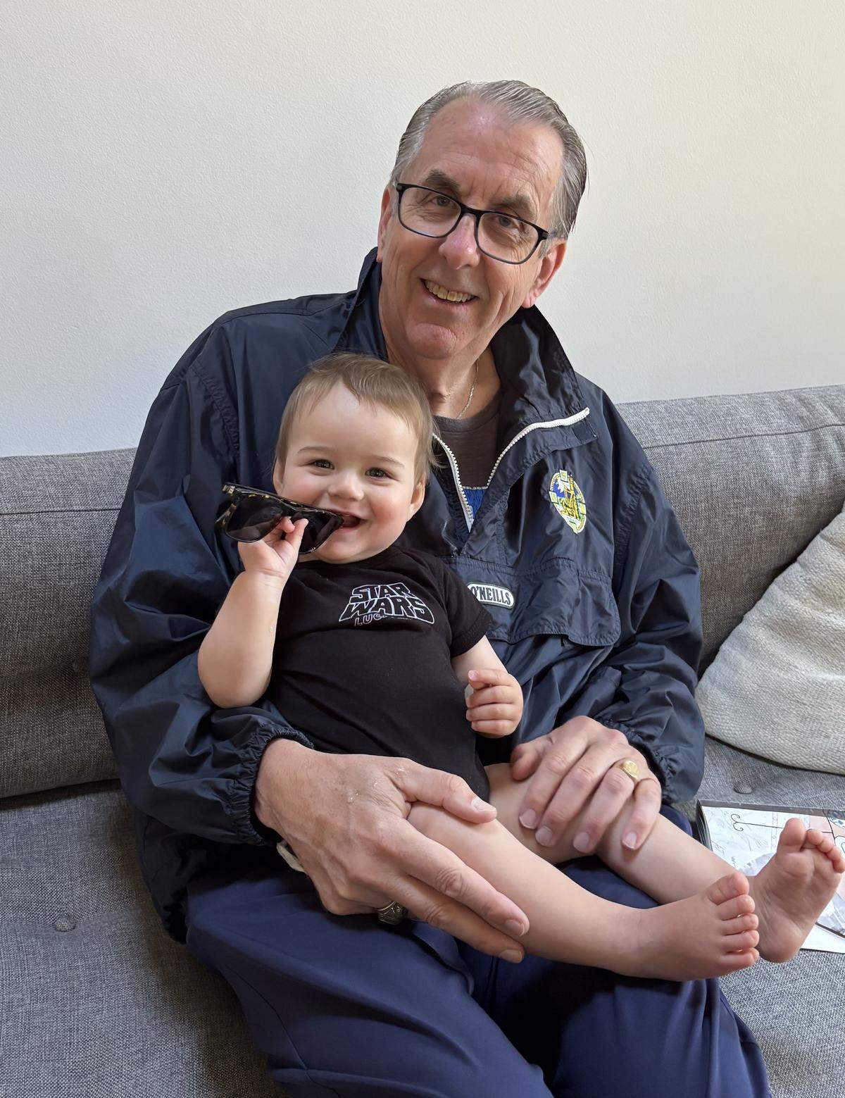Tom Shine and his first grandchild, grandson Mino, whom he’ll hopefully get to spend lots more time with in retirement.