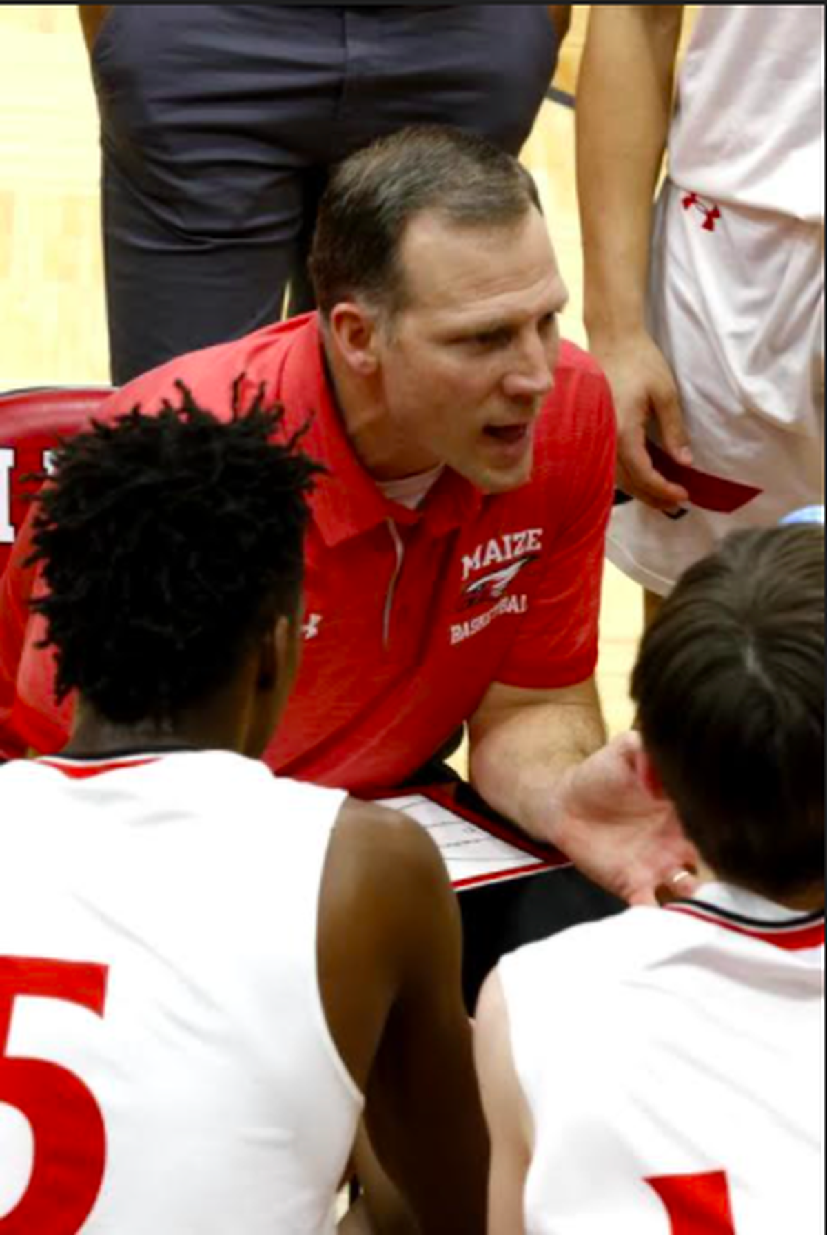 Maize coach Chris Grill