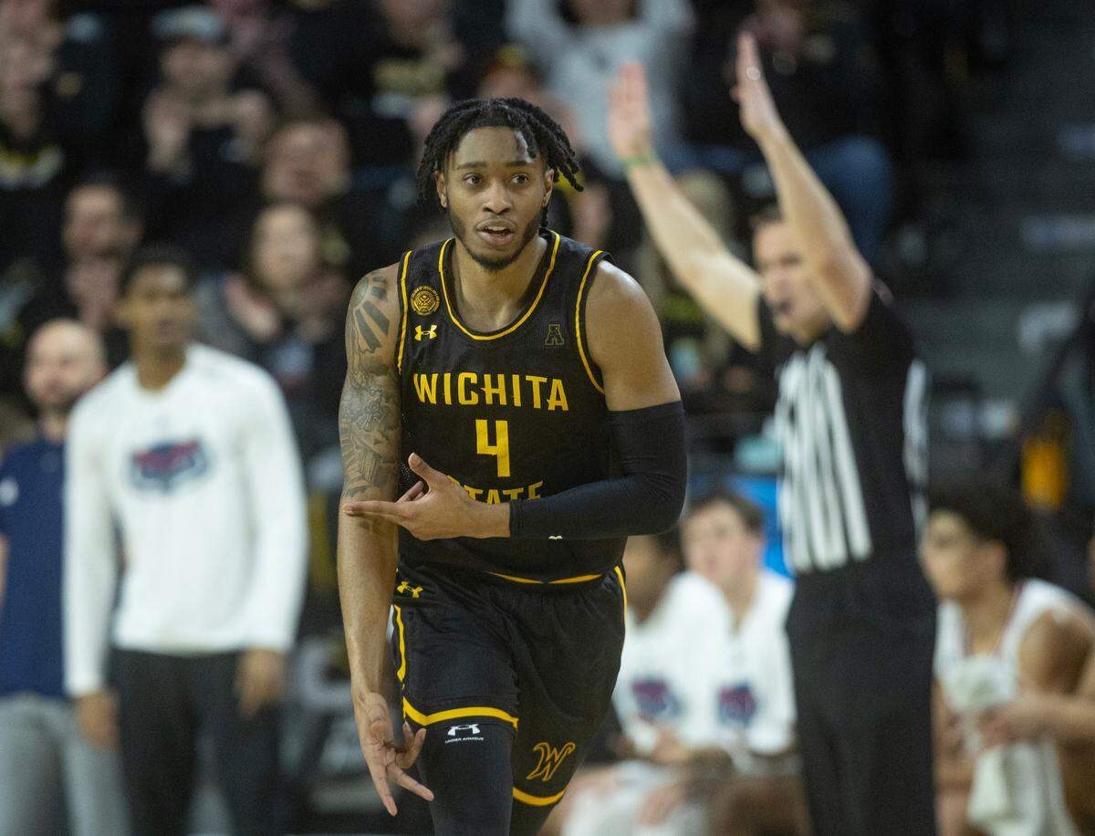 Wichita State’s Colby Rogers celebrates a three-pointer during the first half on Sunday.