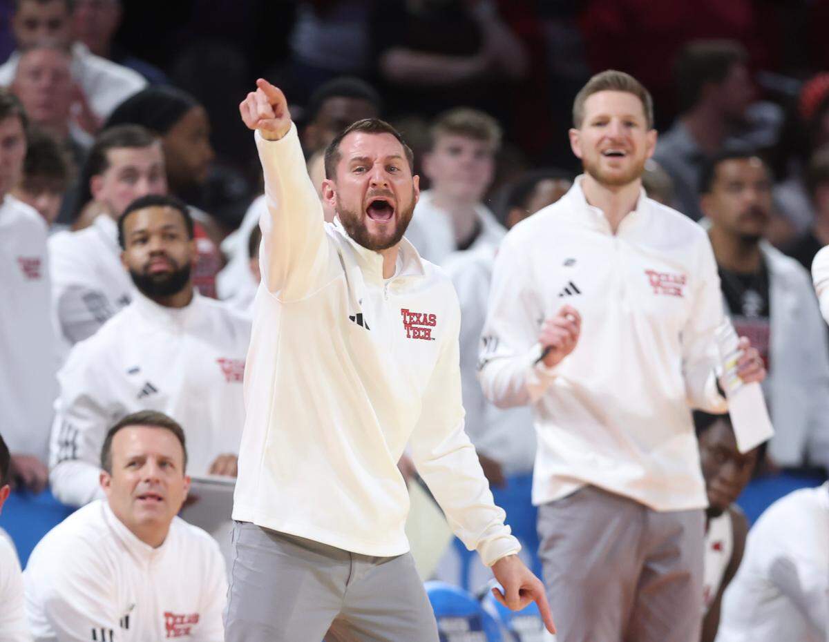 Texas Tech assistant Matt Braeuer yell instructions during the game against Drake.