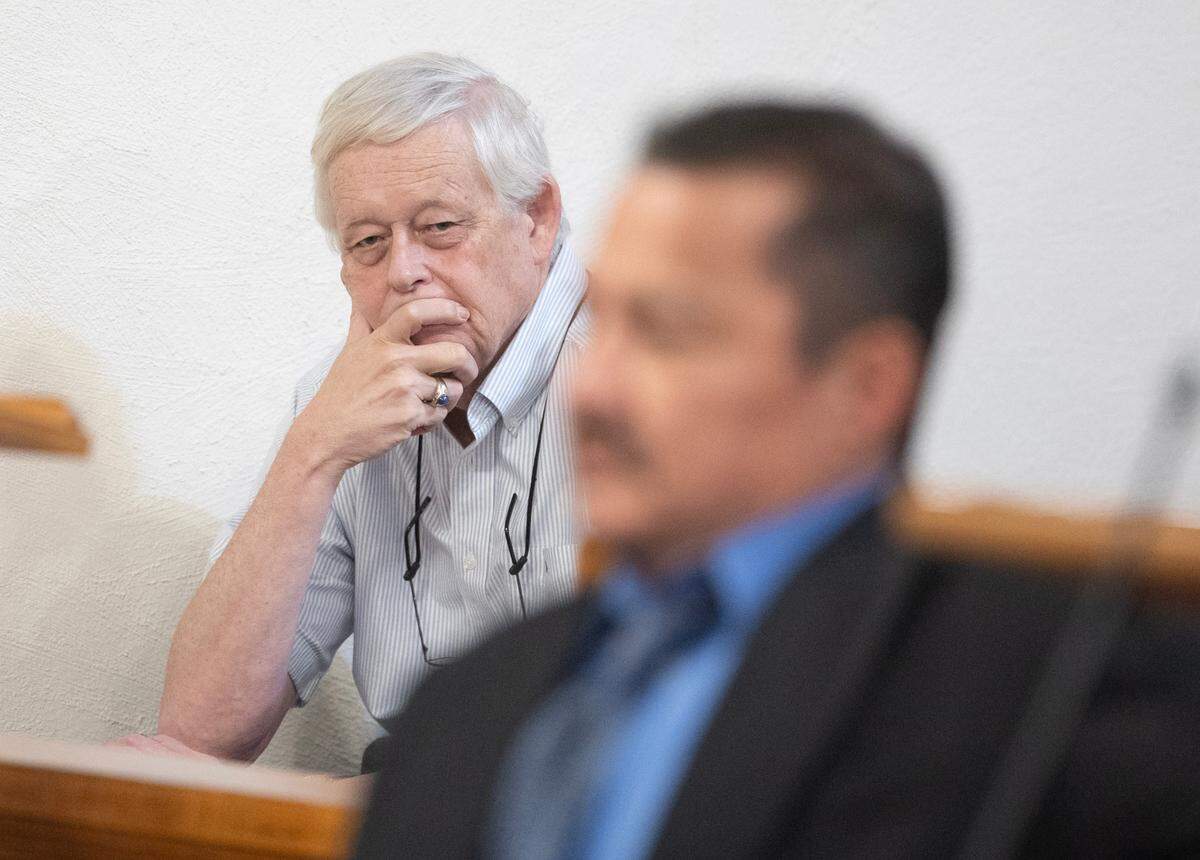 Eric Meyer, the editor of the Marion County Record, looks at Gideon Cody during Cody’s his first court appearance in a Marion County, Kansas court on Monday, Oct. 7, 2024 on a single felony charge related to a raid on the Record in August 2023. Cody was the Marion police chief at the time the raid was carried out. (Travis Heying/The Wichita Eagle - POOL via AP)