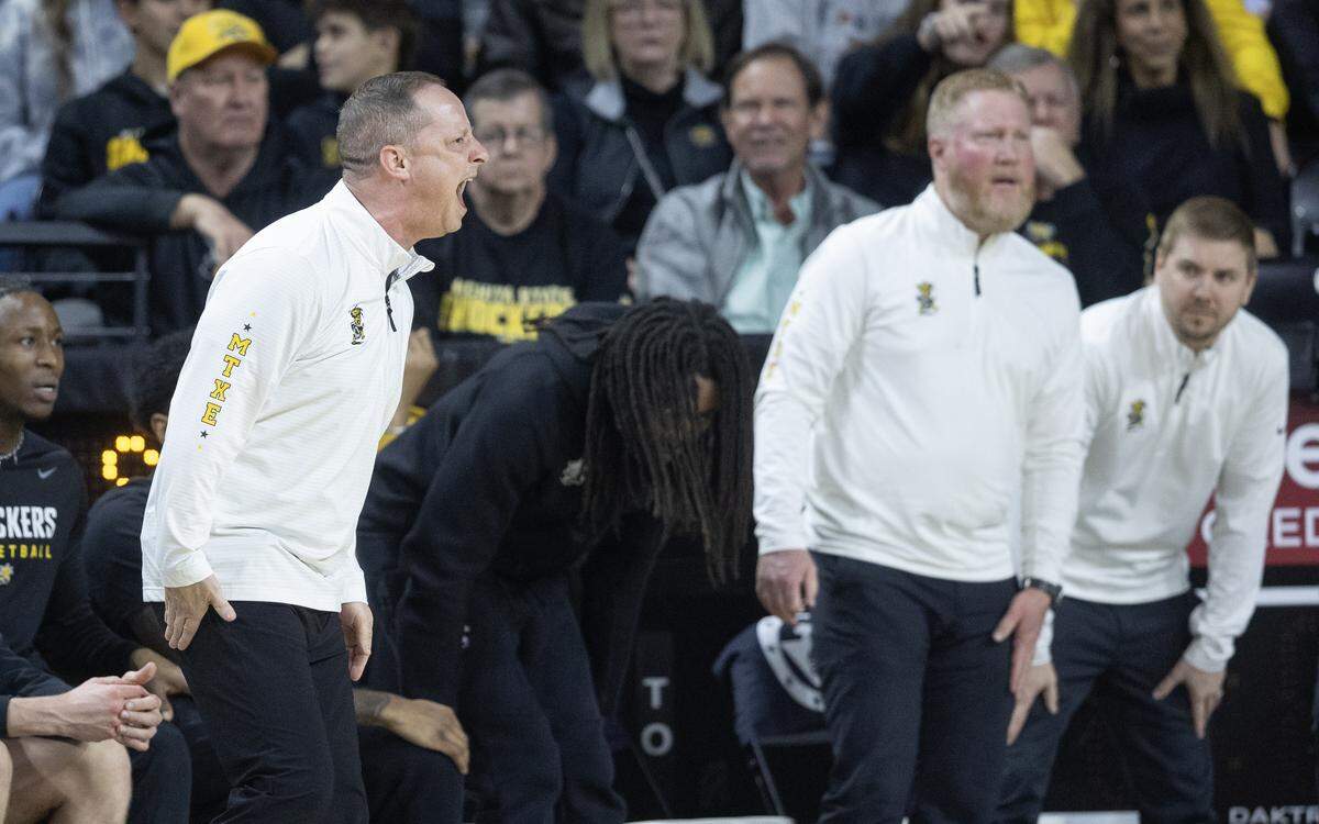 Wichita State coach Paul Mills yells at the refs after a timeout called by Will Berg wasn’t noticed during the final seconds of the first half on Saturday night at Koch Arena.