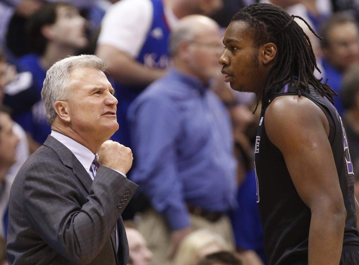 Kansas State coach Bruce Weber scolds player D.J. Johnson during the first half against Kansas on Monday night at Allen Fieldhouse in Lawrence. (Feb. 11, 2013)