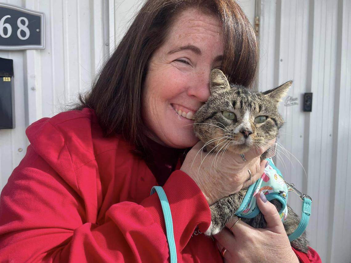 Edgar and Ivy’s Cat Sanctuary founder Anissa Beal with her boss, Esbee. Beal initially helped rescue Esbee, who originally was known as SB after Wichita’s SB Mowing, then Esbee and SB Mowing’s online followers helped rescue the sanctuary.