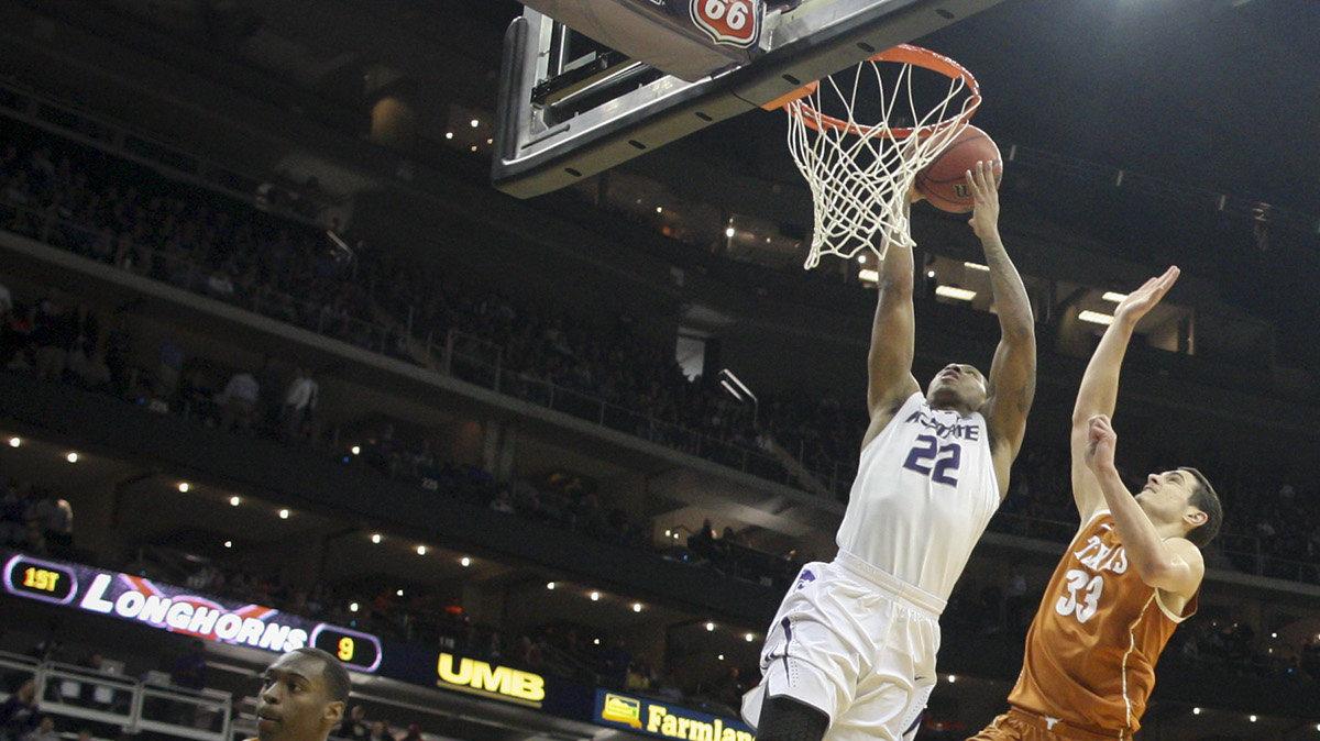 Kansas State's Rodney McGruder goes up for a shot against Texas' Ioannis Papapetrou during the first half of their quarterfinal round game of the Big 12 Tournament in Kansas City on Thursday. (March 14, 2013)
