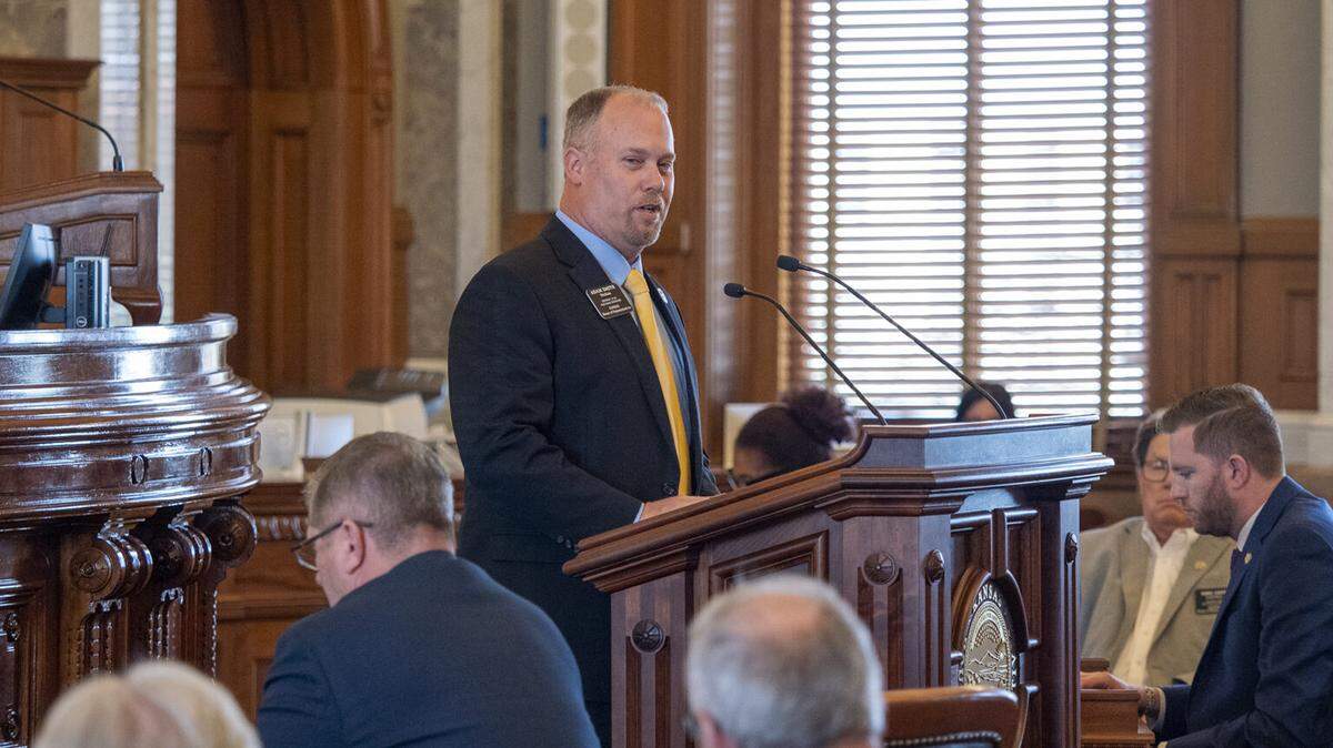 Rep. Adam Smith, a Weskan Republican and chairman of the House Taxation Committee, says the Legislature needs to take action to slow annual increases in city or county property taxes. In this image, Smith addresses House colleagues on April 10, 2025.