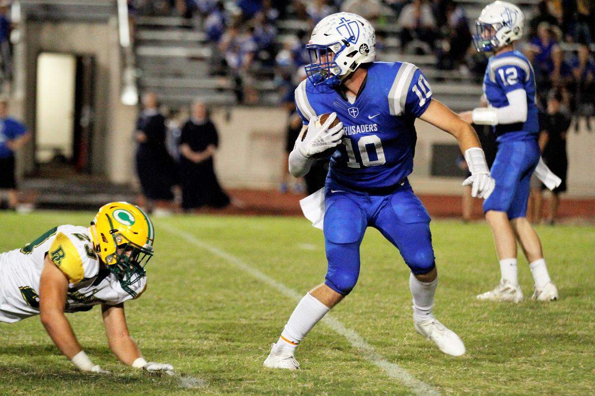 Kapaun senior Scott Valentas switches field against Bishop Carroll during the Golden Eagles’ 28-14 win at Kapaun on Friday. (Oct. 5, 2018)
