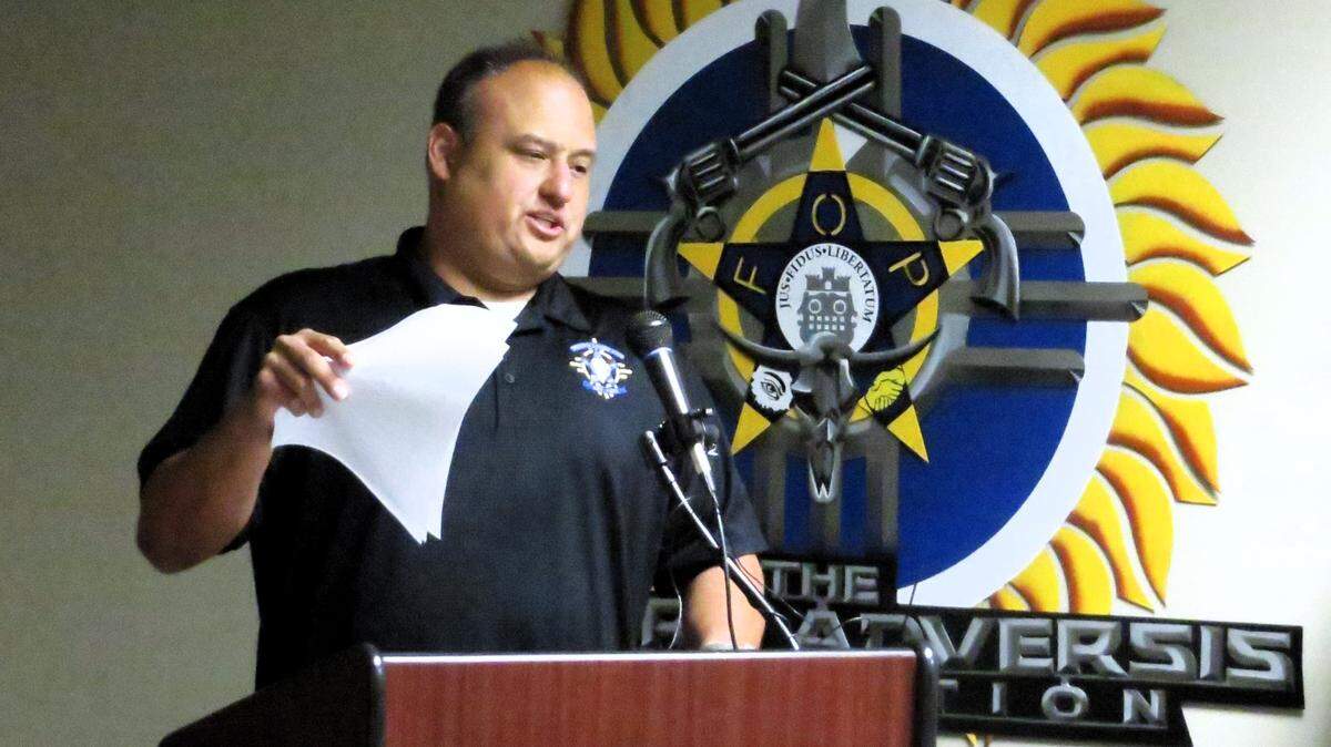 David Inkelaar, president of the Wichita Fraternal Order of Police, criticizes Mayor Brandon Whipple at a press conference.