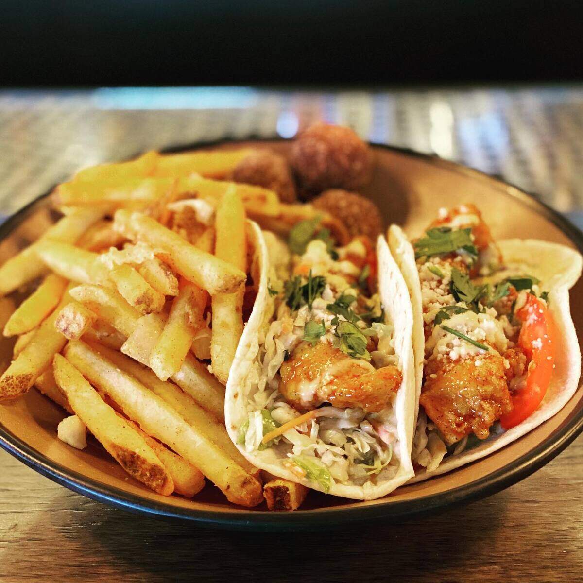 Sticky Bird also serves tacos made with chicken fingers.