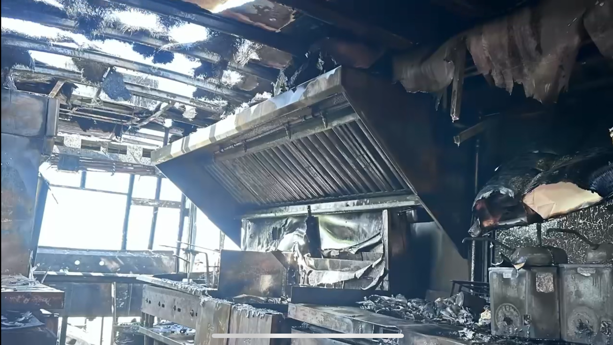 The burned equipment inside Ken N Barbie’z Rolling Diner