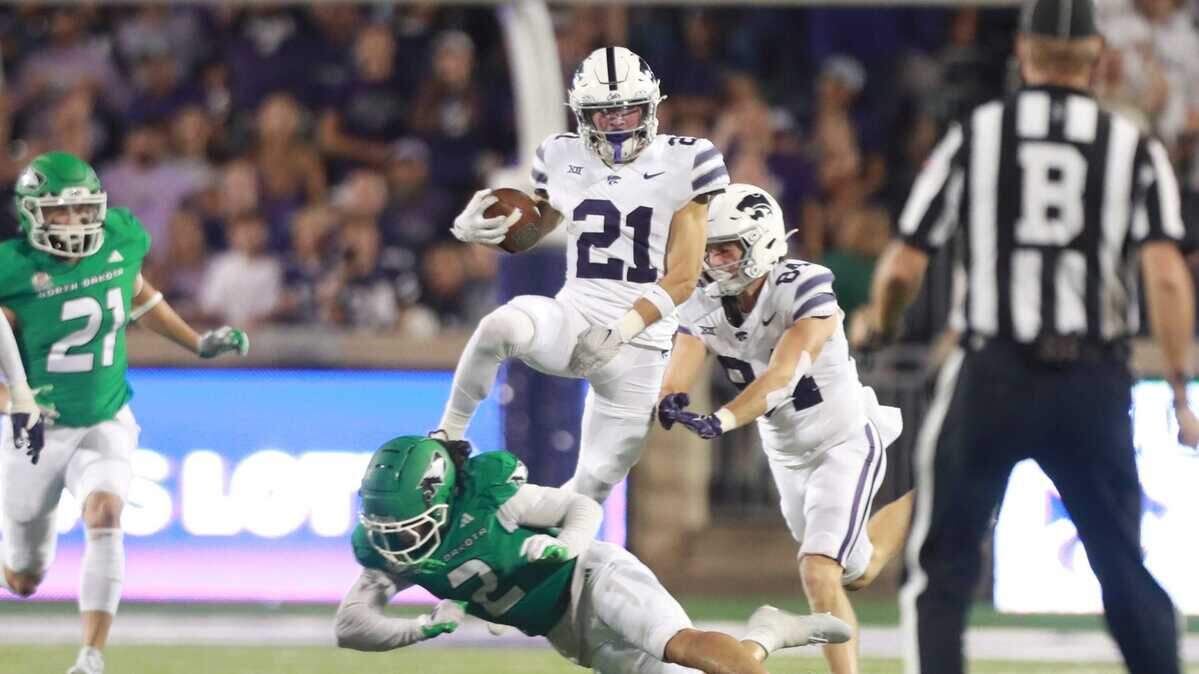 Kansas State Wildcats wide receiver Bryce Noernberg (21) avoids a tackle during the second half against the North Dakota Fighting Hawks at Bill Snyder Family Stadium on Aug. 30, 2025.