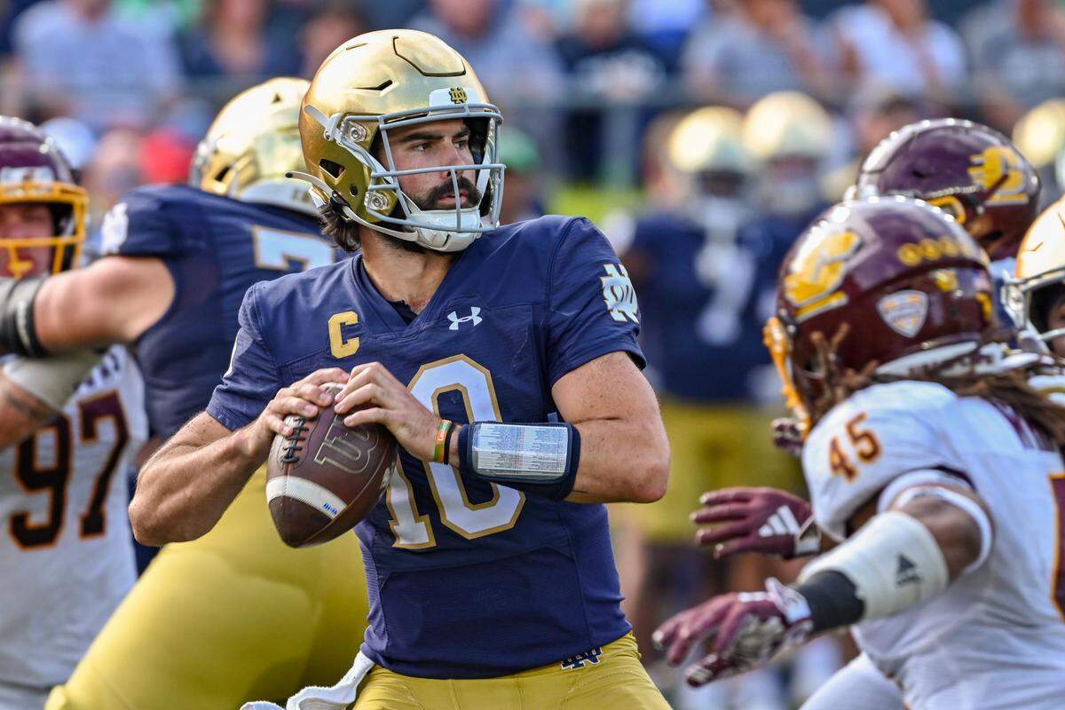 Notre Dame Fighting Irish quarterback Sam Hartman (10) throws in the third quarter against the Central Michigan Chippewas at Notre Dame Stadium.