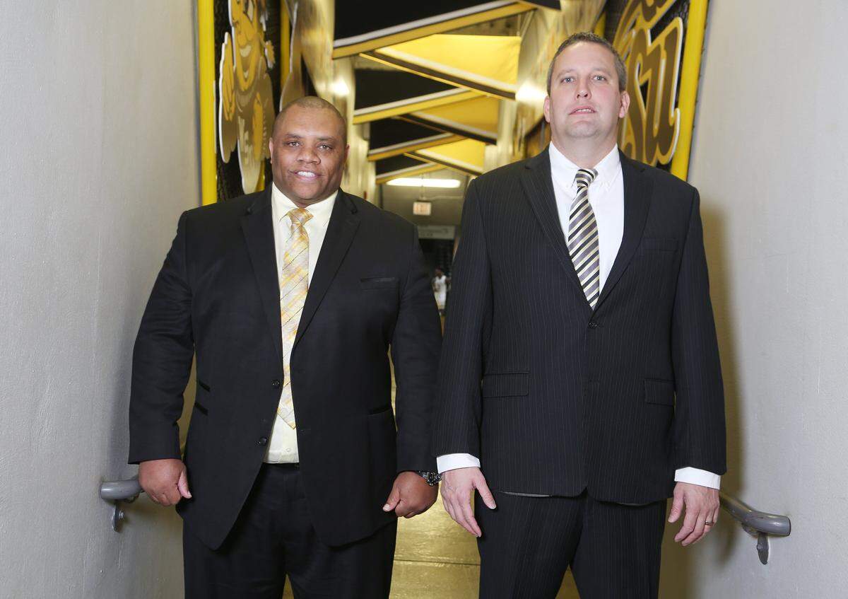 WSU assistant coaches Tyson Waterman (left) and Lou Gudino (right) are in their first seasons on Gregg Marshall’s coaching staff with the Shockers (October 16, 2018).