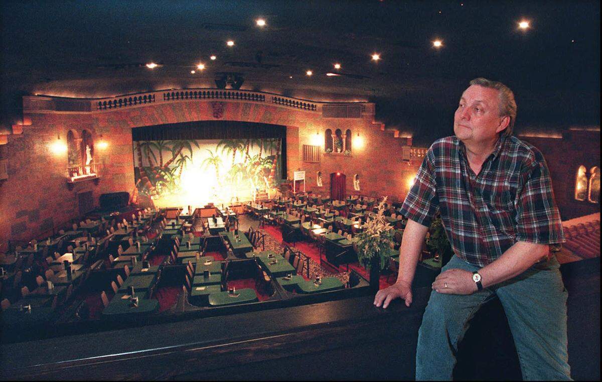 Longtime Crown Uptown owner and director Ted Morris is pictured in the theatre in 1998.