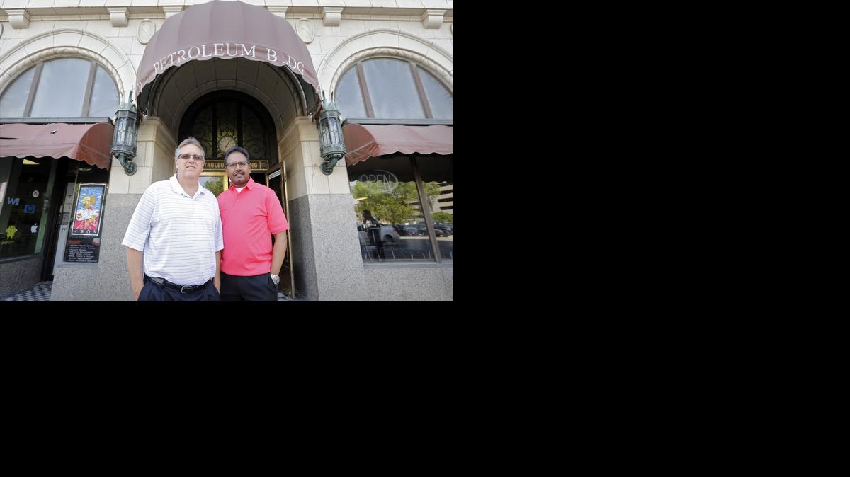 Kyle Hughes, left, and Emmanuel Kolluri are investors in the Petroleum Building. They are the tenants who negotiated to take over the building from the Minnesota Guys when the troubled developers went into the financial tailspin. (May 8, 2014)

