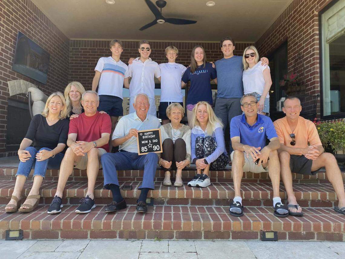Russ Meyer, Jr. and his wife, Helen, surrounded by their five children, spouses and their five grandchildren.