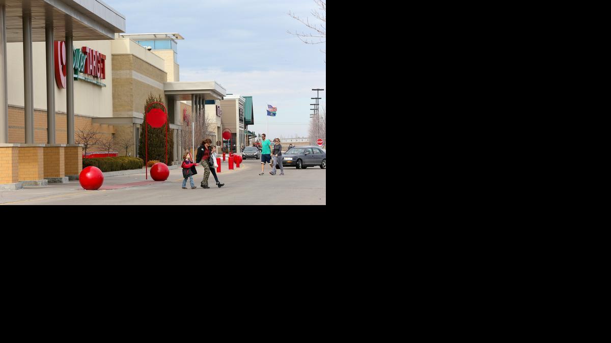 Shoppers visit the Regency Lakes shopping center at 21st and Greenwich in February. Developer George Laham predicts Greenwich Road will be the next big retail corridor.

