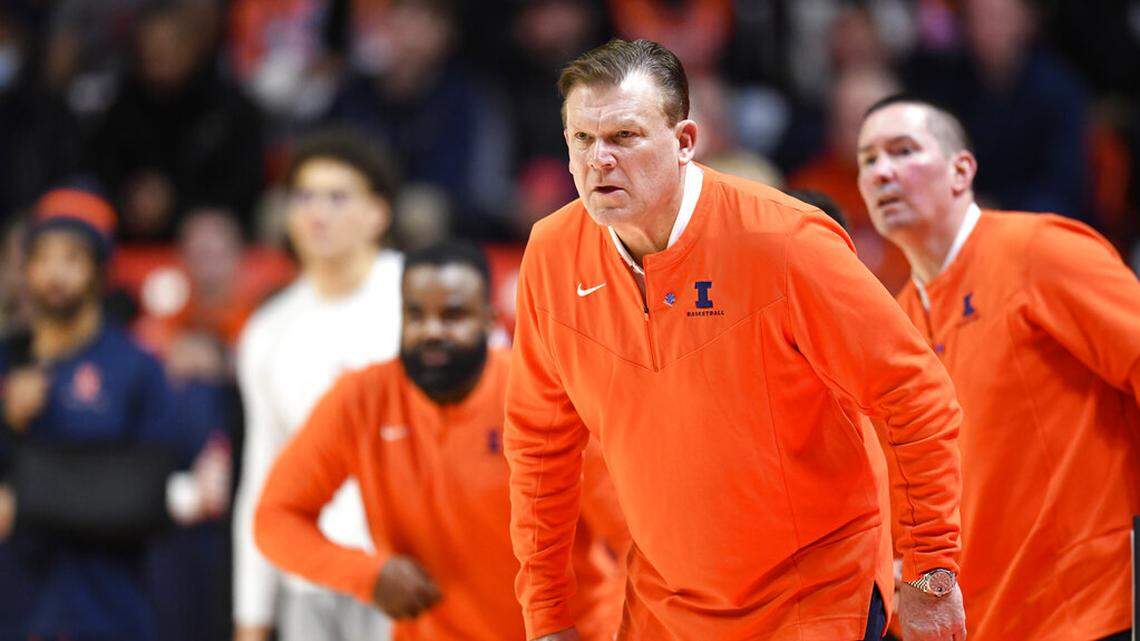 Illinois coach Brad Underwood watches during the first half of an NCAA college basketball game against Iowa, Sunday, March 6, 2022, in Champaign, Ill.
