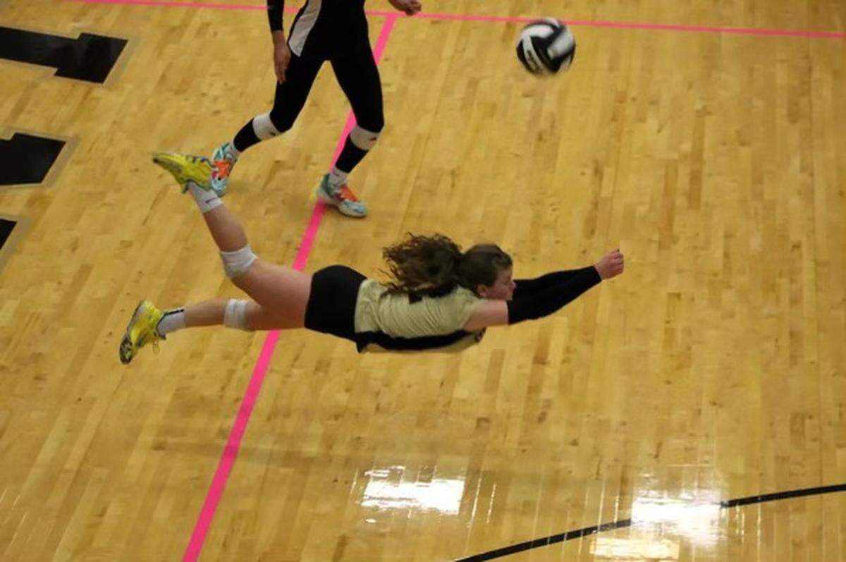 Andover Central senior libero Willow Deckinger has earned the moniker “the flying squirrel” for her fearless play on the back row.