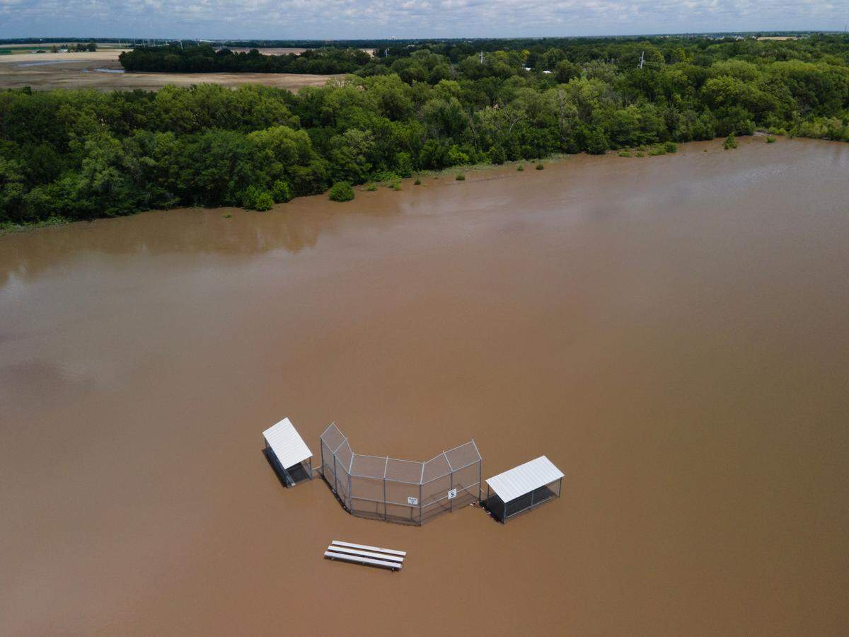 The baseball fields at the Northwest YMCA at 13838 W. 21st St. are completely underwater. The nearby 125th Street just north of 21st is also covered in water and closed to traffic.
