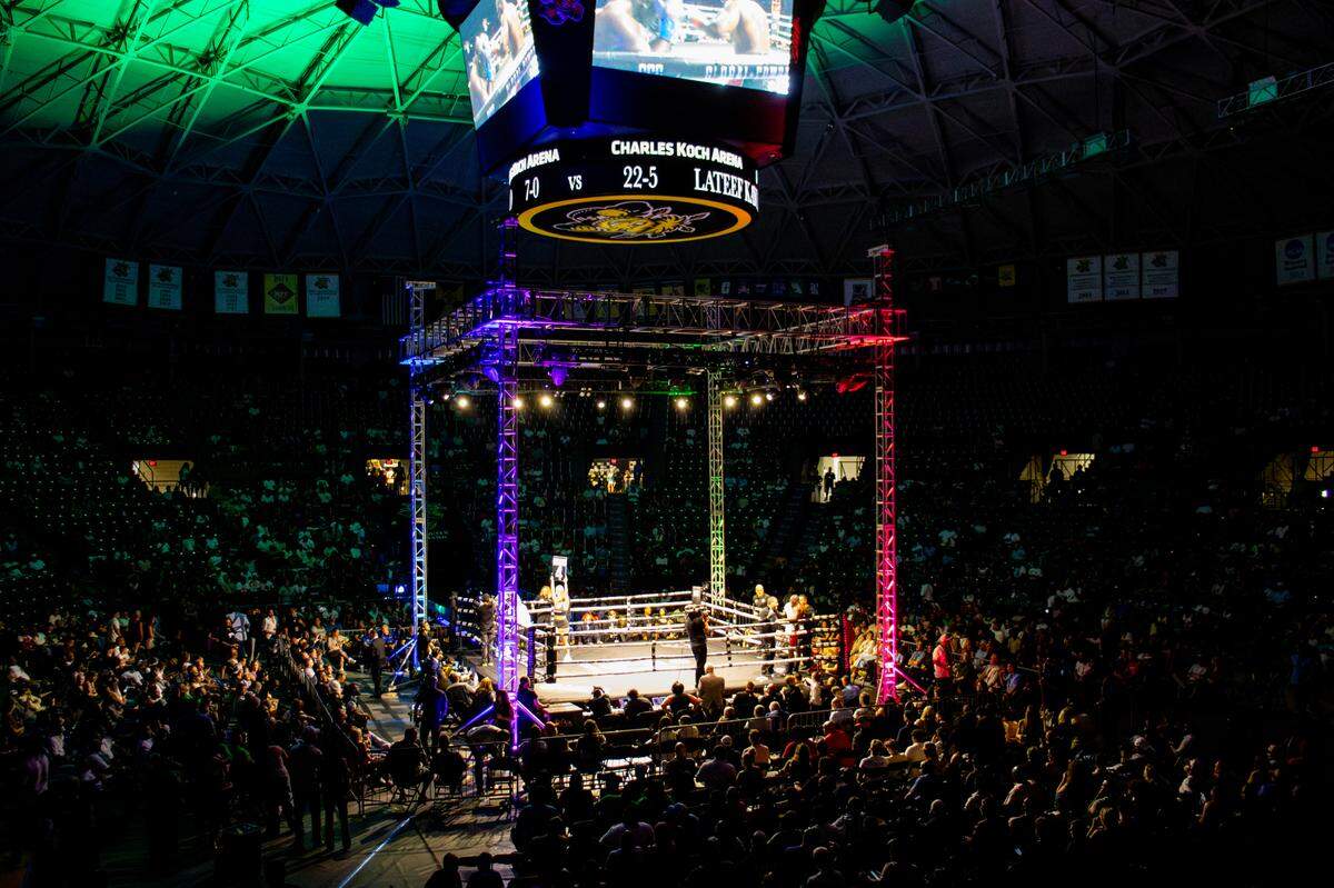 Charles Koch arena’s basketball court transformed into a boxing ring Friday night for “Legacy Reloaded.” The boxing event featured 12 different matchups.
