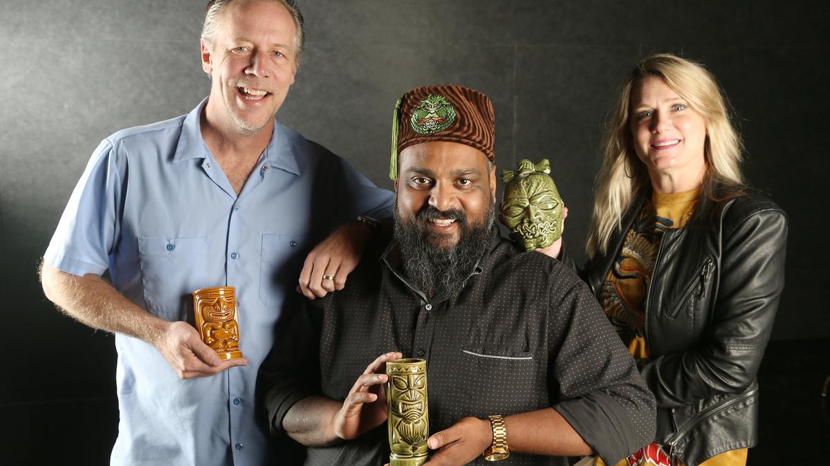 Alex Thomas, center, is opening the Lava & Tonic tiki bar with Paul and Jennifer Drace.