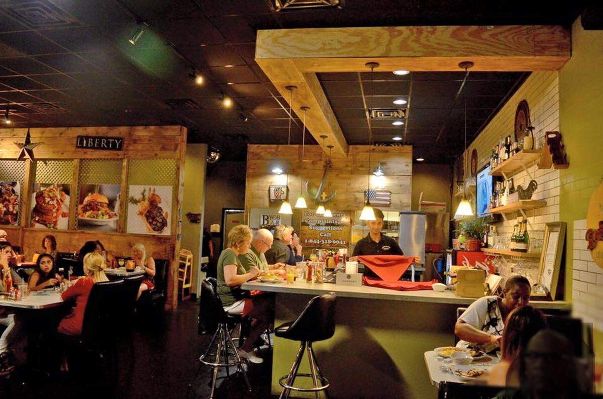 The interior of Chops & Eggs features lots of pine and cedar.