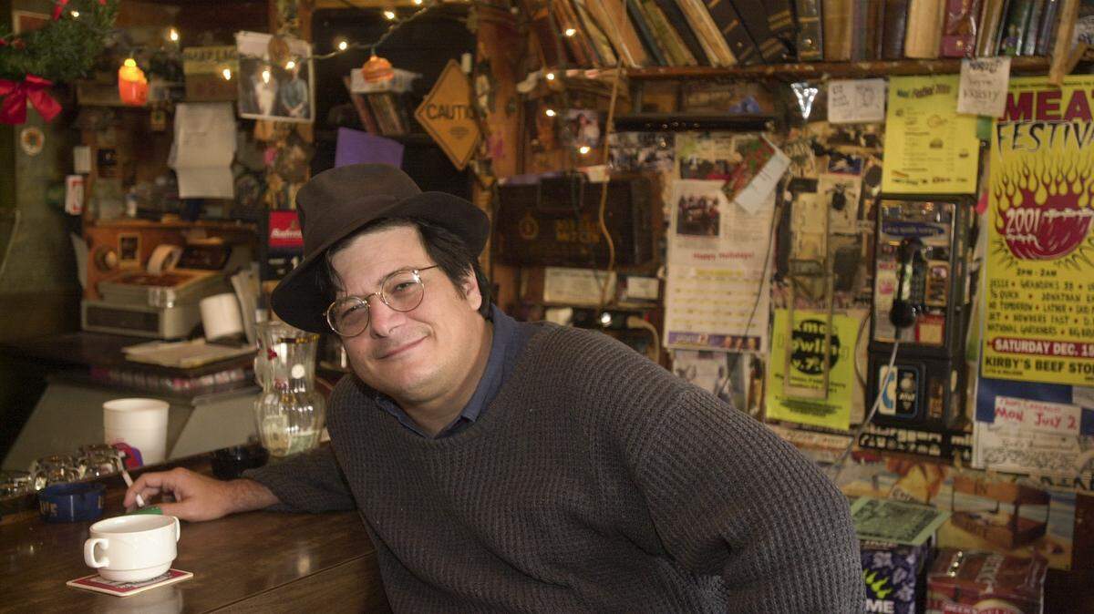 Bud Norman is pictured in 2000 at his home away from home, Kirby’s Beer Store. Norman, a longtime Wichita Eagle journalist, died this week at age 61.