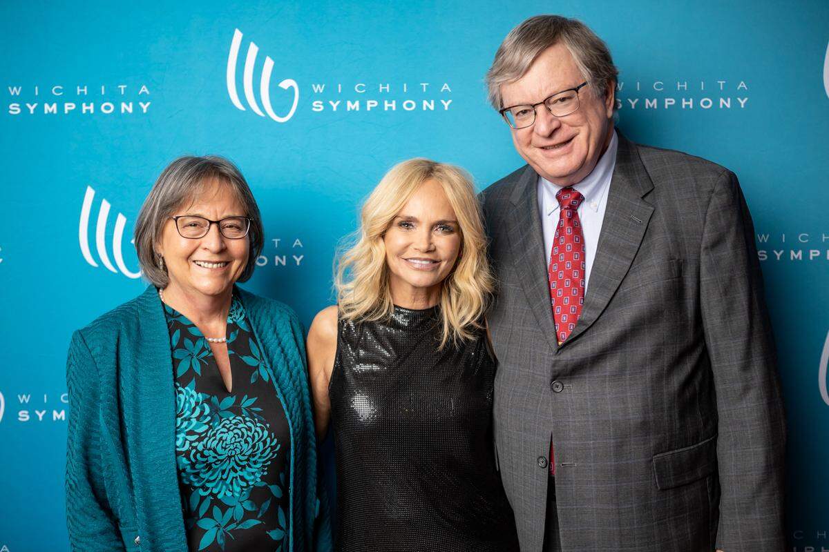 Don Reinhold, right, and his wife, Pat, left, are pictured with Broadway and television star Kristin Chenoweth when she performed with the Wichita Symphony Orchestra in 2022..