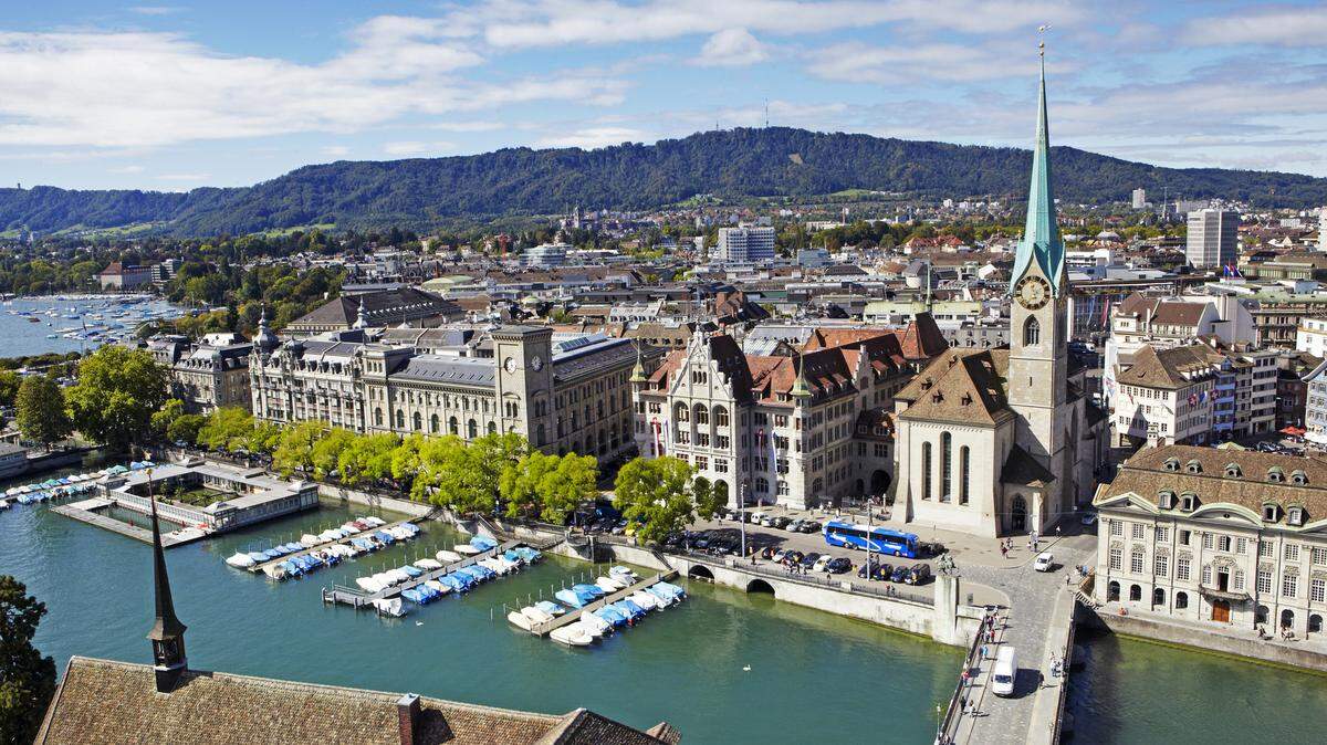 The skyline of Zurich, Switzerland, with Fraumunster church, the Limmat River and Lake Zurich from Grossmunster church