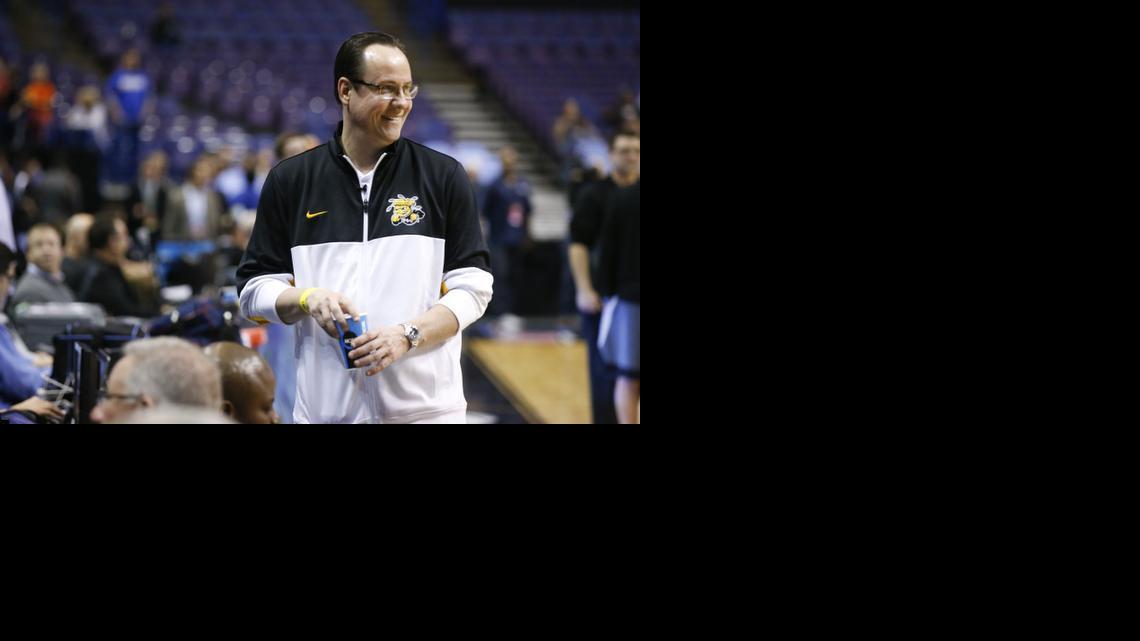 Wichita State's head coach Gregg Marshall smiles in the final minute of a short practice at Scottrade Center. WSU will face Cal Poly in the second round of the NCAA tournament. (March 20, 2014)


