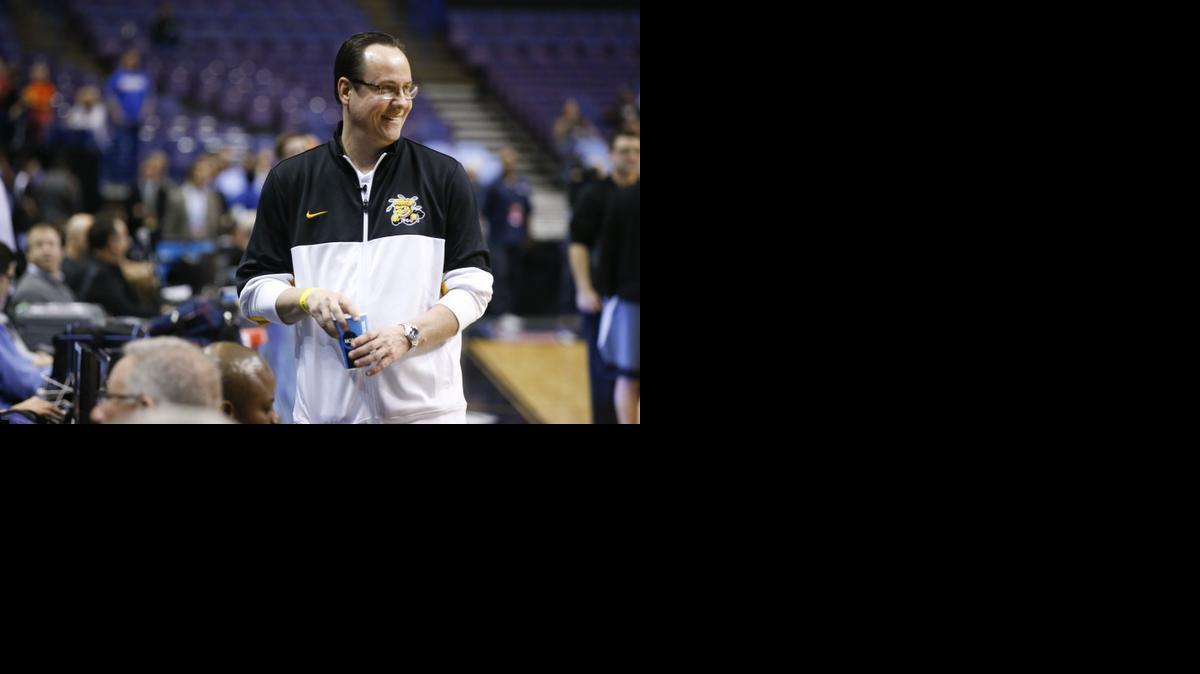 Wichita State's head coach Gregg Marshall smiles in the final minute of a short practice at Scottrade Center. WSU will face Cal Poly in the second round of the NCAA tournament. (March 20, 2014)

