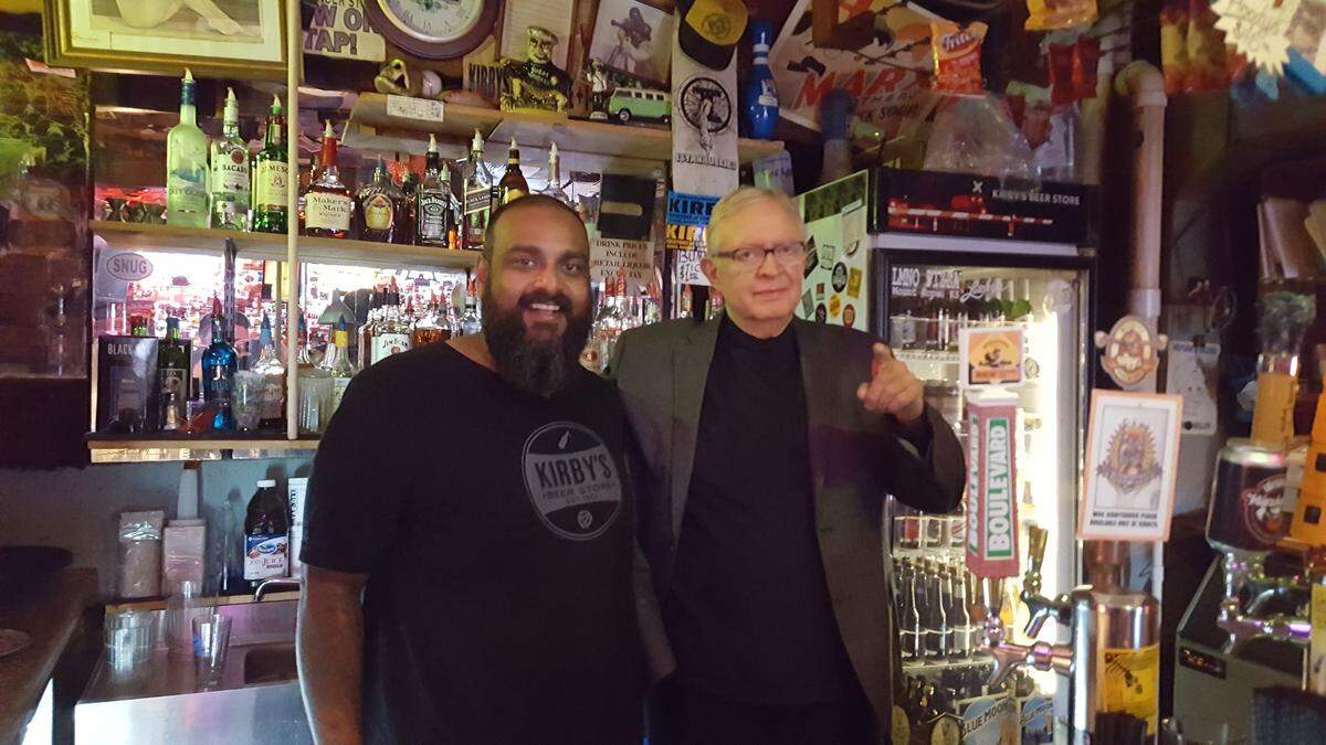 Kirby’s Beer Store owner Alex Thomas, left, with the original owner and namesake Jim Kirby.